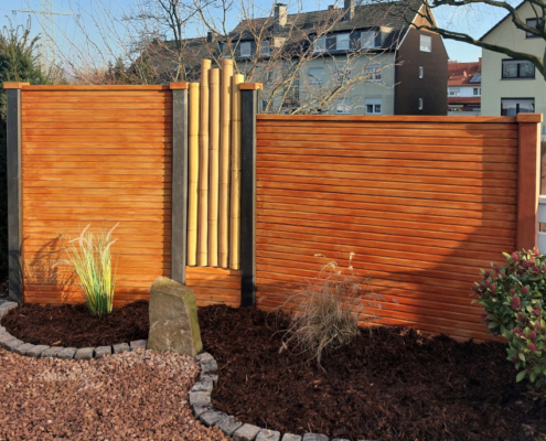 Betonzaun Kombination mit Bambus, Motiv Kopenhagen in Holzoptik